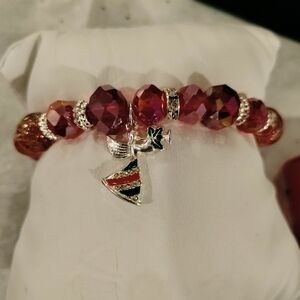 NIB Avon Ruby Red and Silver Beaded Angel Charm Bracelet